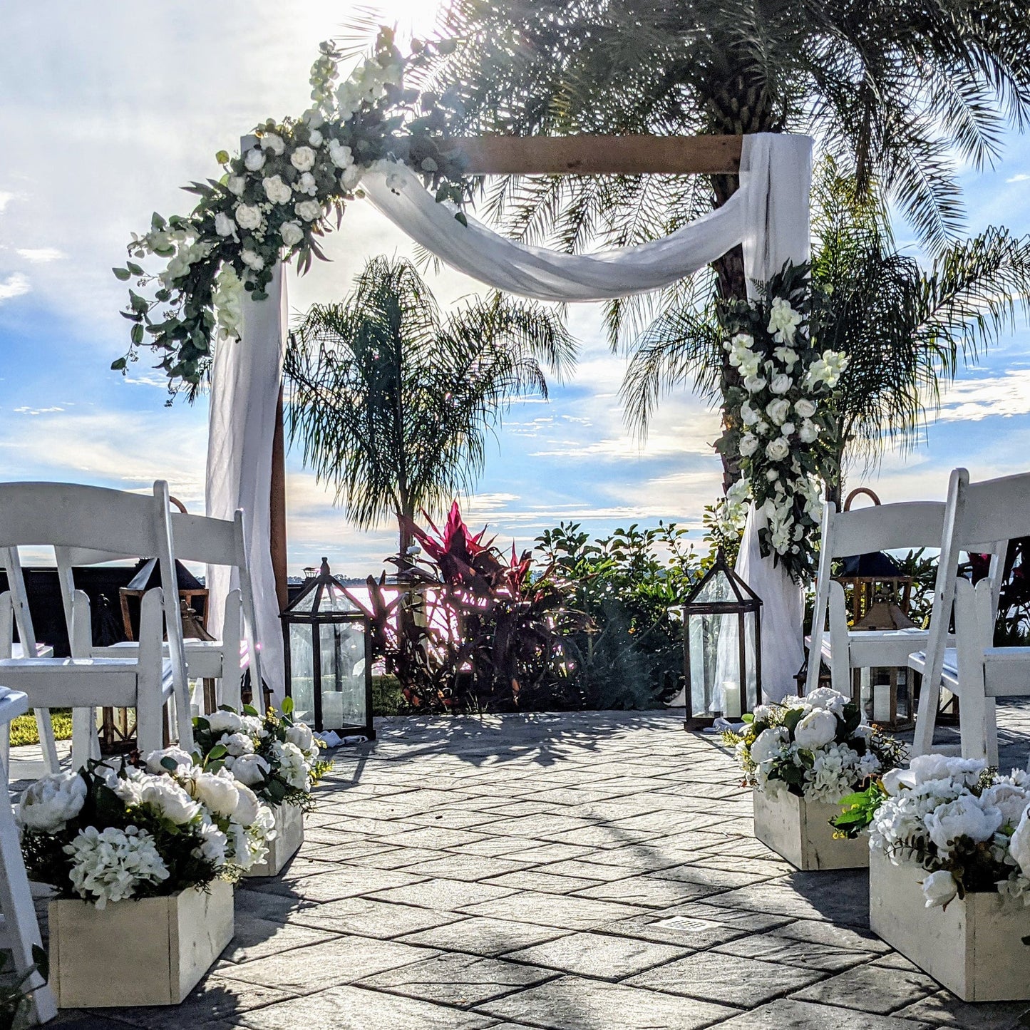 A Stunning Day Wedding Ceremony Package (Officiant, Photographer, Decor with Seating)