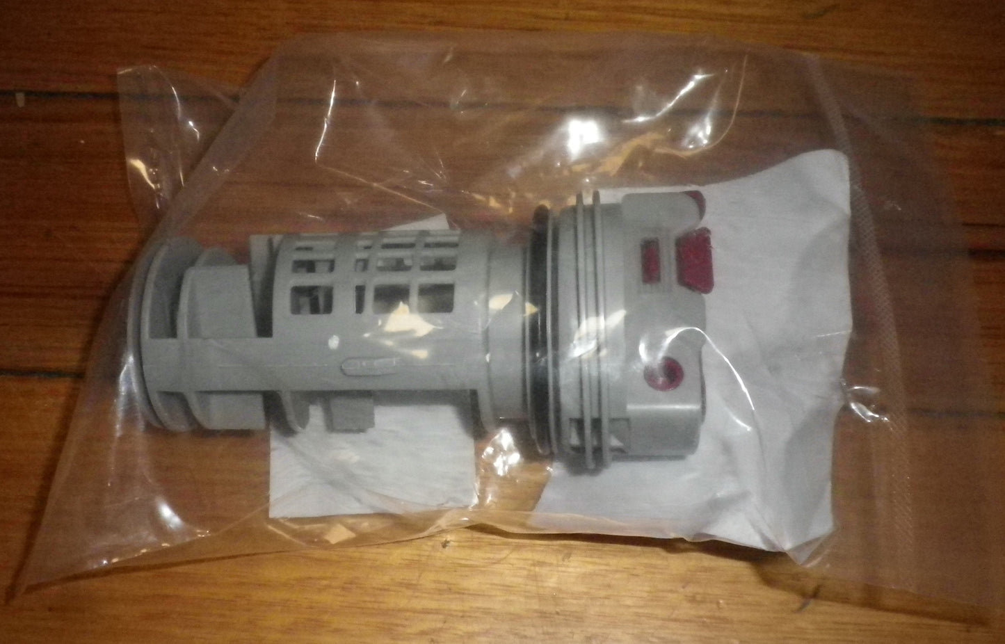 AEG, Electrolux Front Loader Pump Lint Filter Button Trap Insert - Part # 140040243036