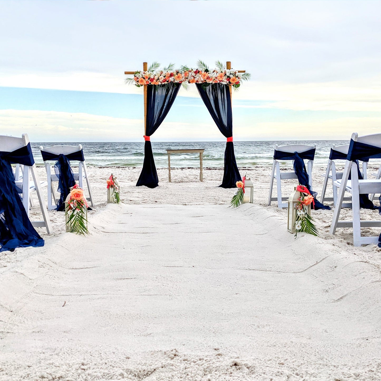 A Stunning Day Wedding Ceremony Package (Officiant, Photographer, Decor with Seating)