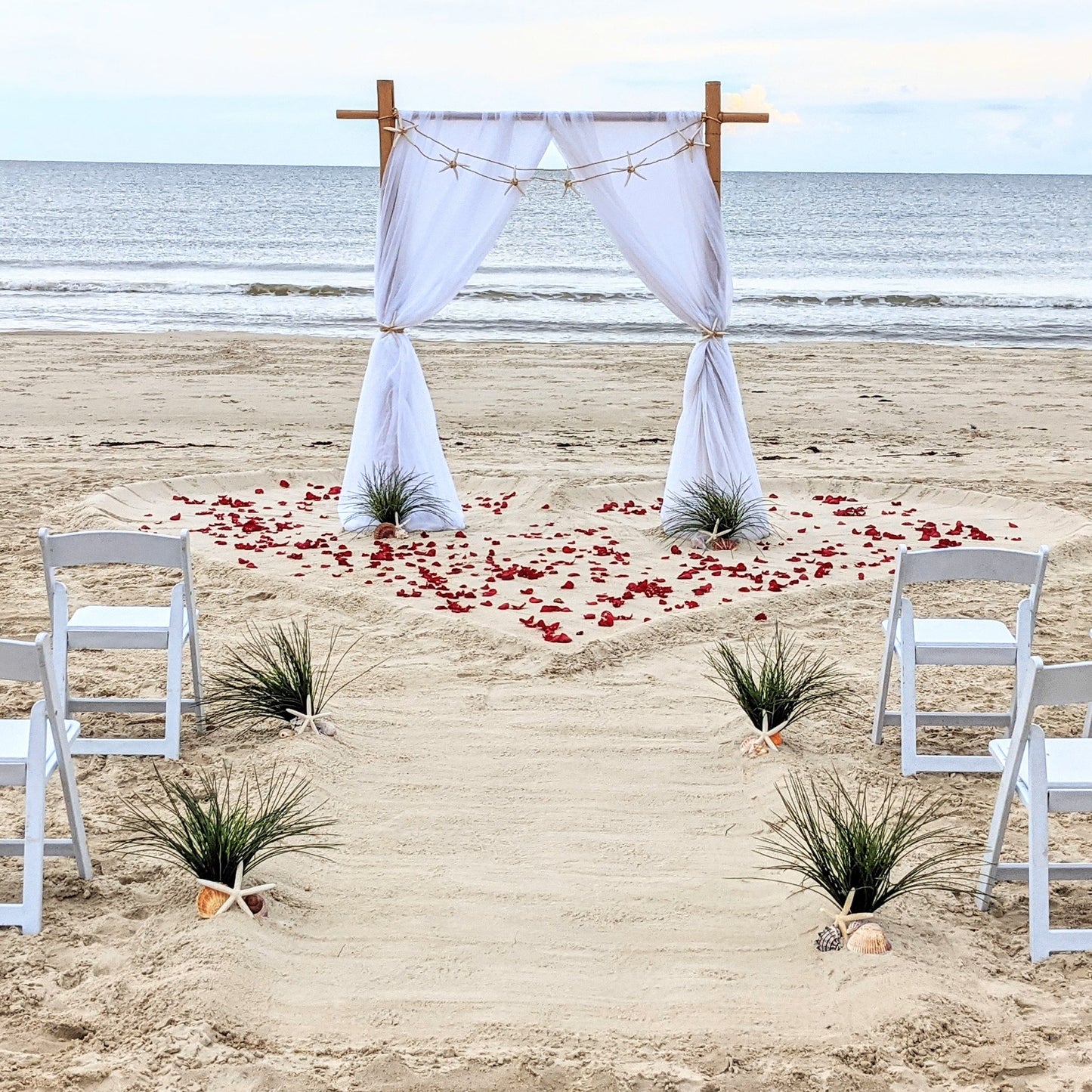 A Stunning Day Wedding Ceremony Package (Officiant, Photographer, Decor with Seating)