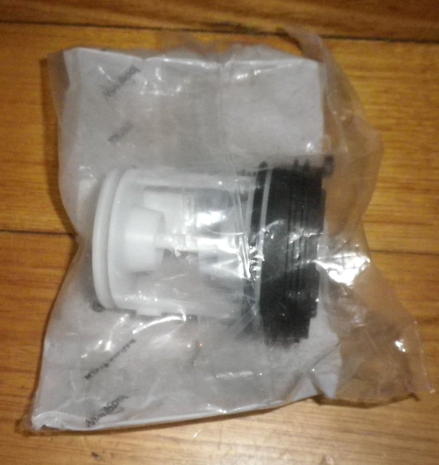 Whirlpool Front Loader Pump Button Trap Filter Insert - Part # 481248058385