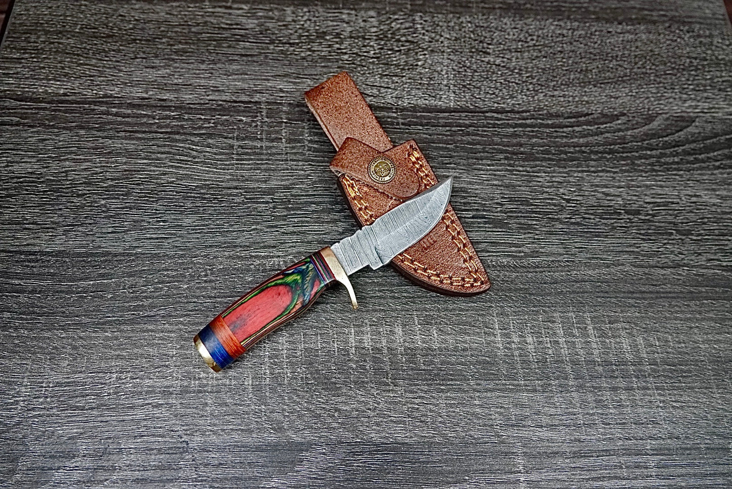 6” custom handmade Damascus steel with finger guard