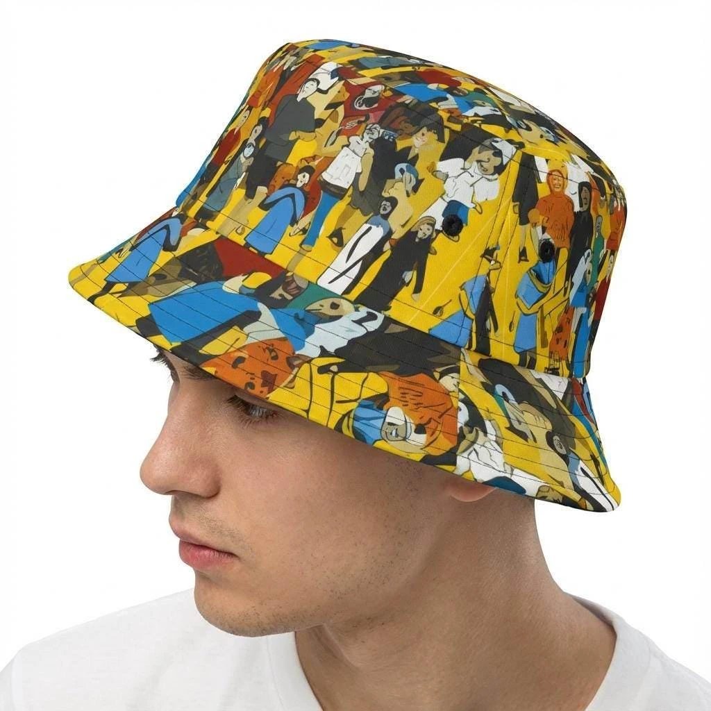 Crowd Theory Illustrated Bucket Hat for Urban Maximalists — Dyles Mavis AOP Where's-Waldo Collage, Bold Yellow Festival Headwear, Made in USA
