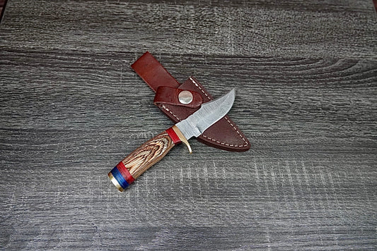 6” custom handmade Damascus steel with finger guard