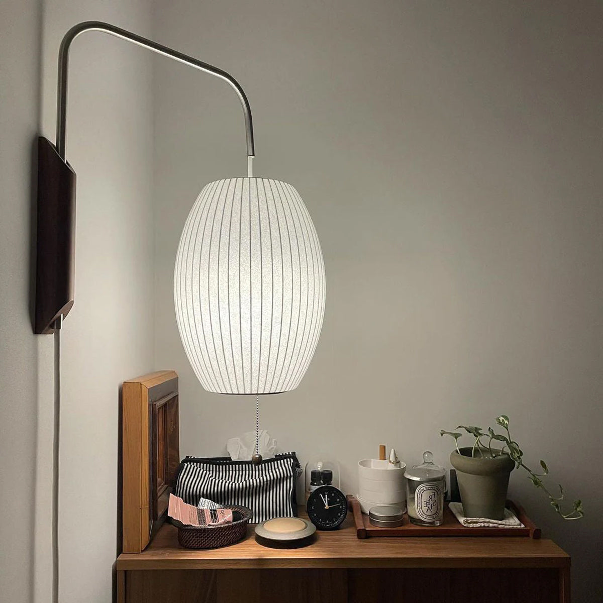 Ribbed Oval Wall Sconce With Pull Chain And Curved Arm