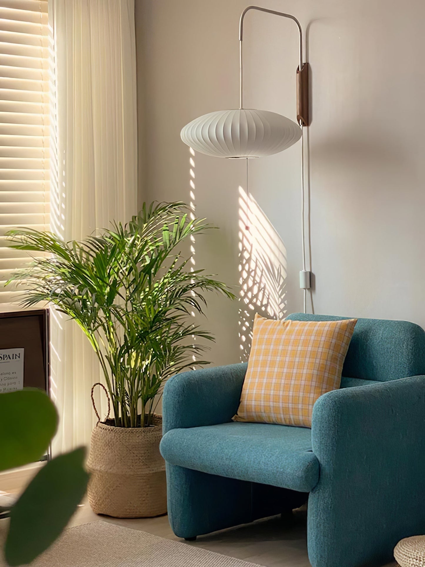 Ribbed Oval Wall Sconce With Pull Chain And Curved Arm