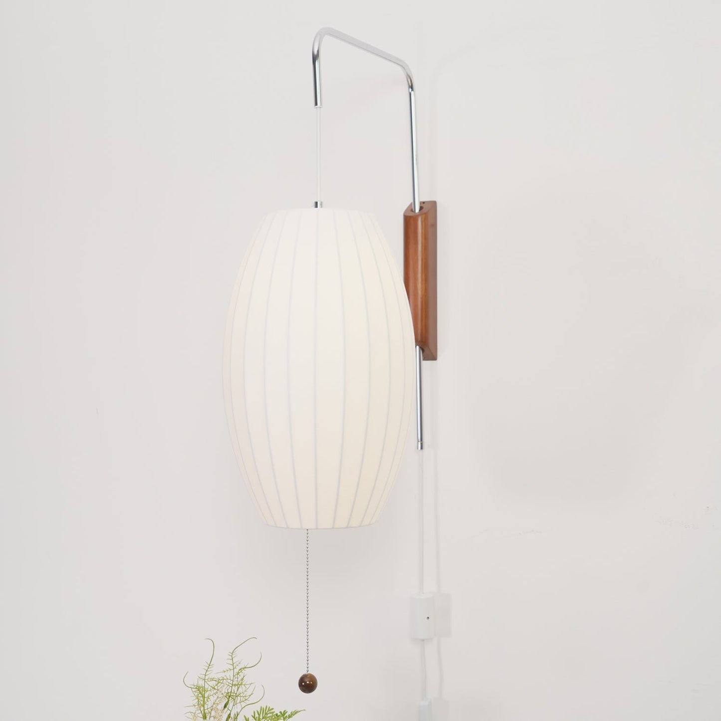 Ribbed Oval Wall Sconce With Pull Chain And Curved Arm