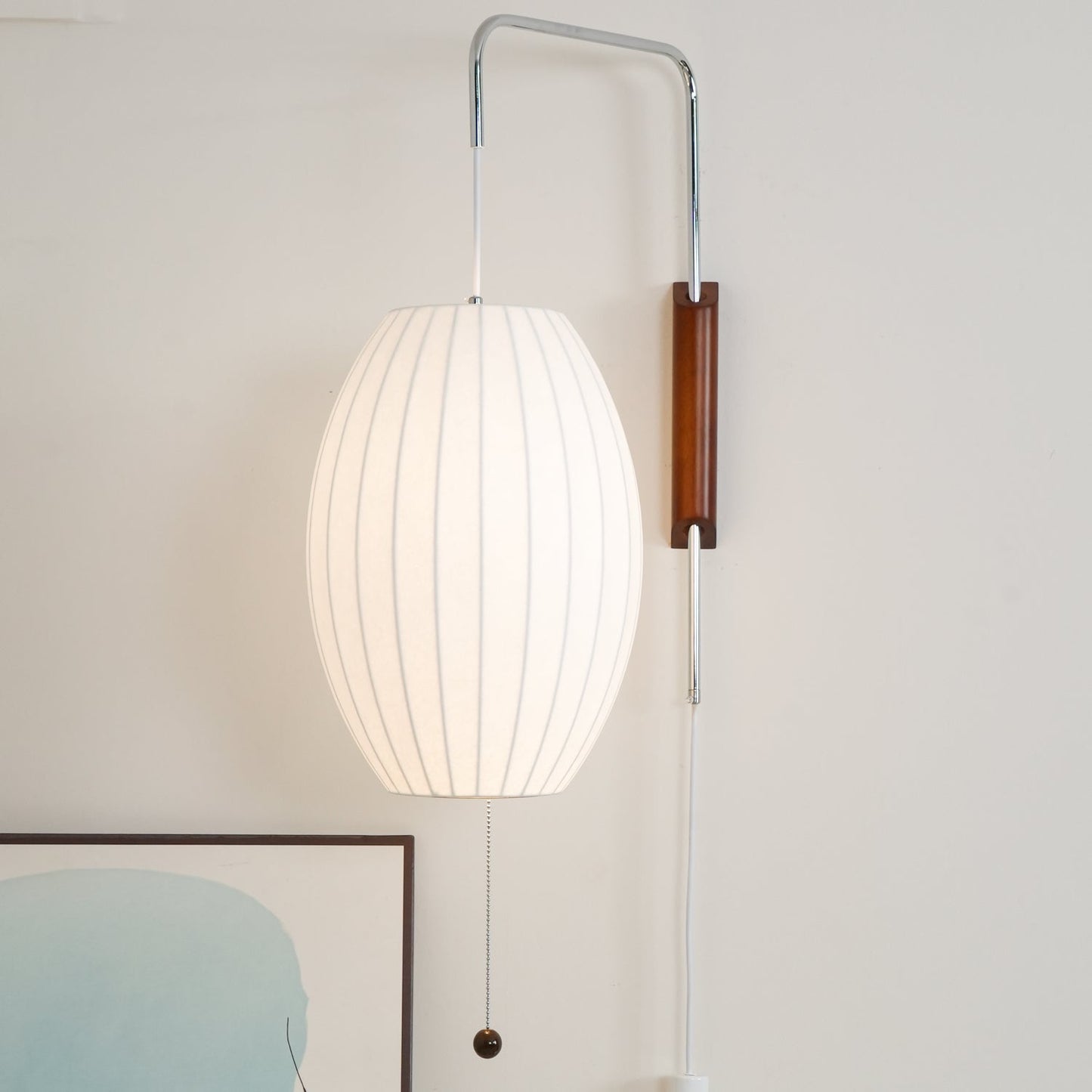 Ribbed Oval Wall Sconce With Pull Chain And Curved Arm