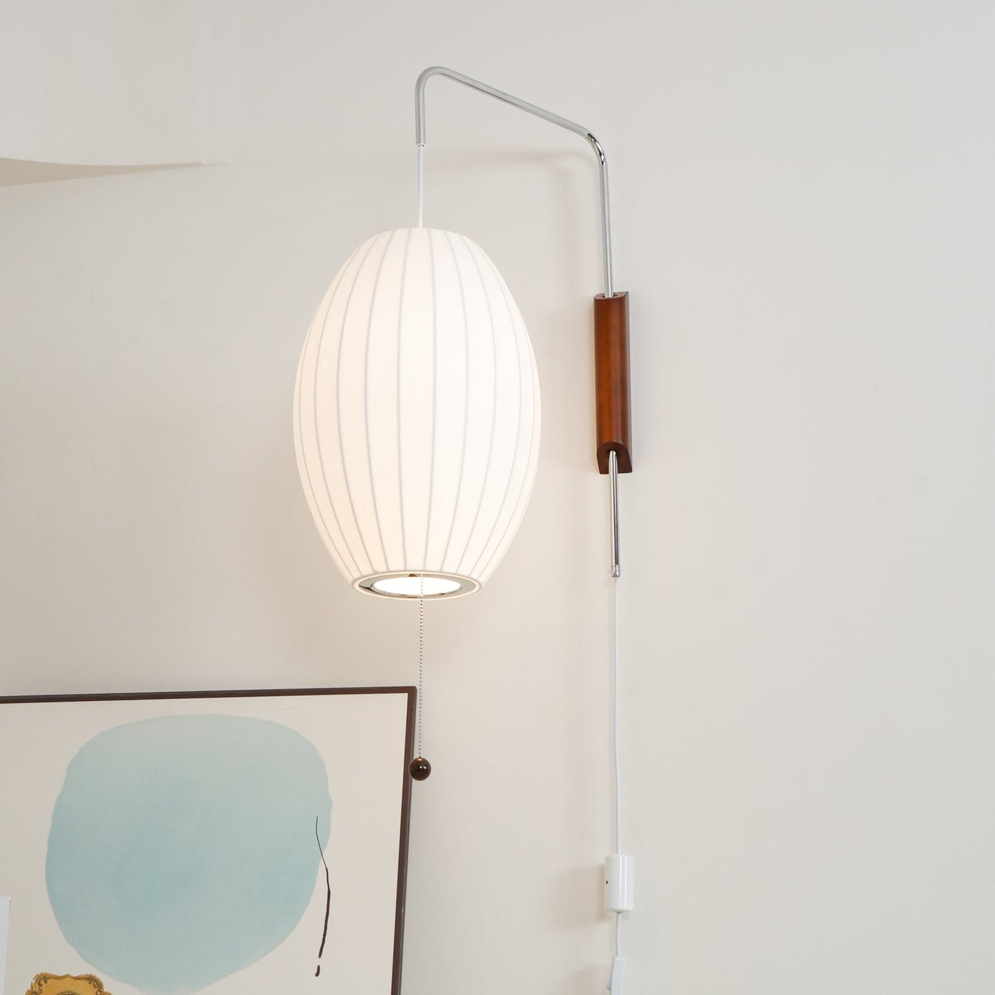 Ribbed Oval Wall Sconce With Pull Chain And Curved Arm