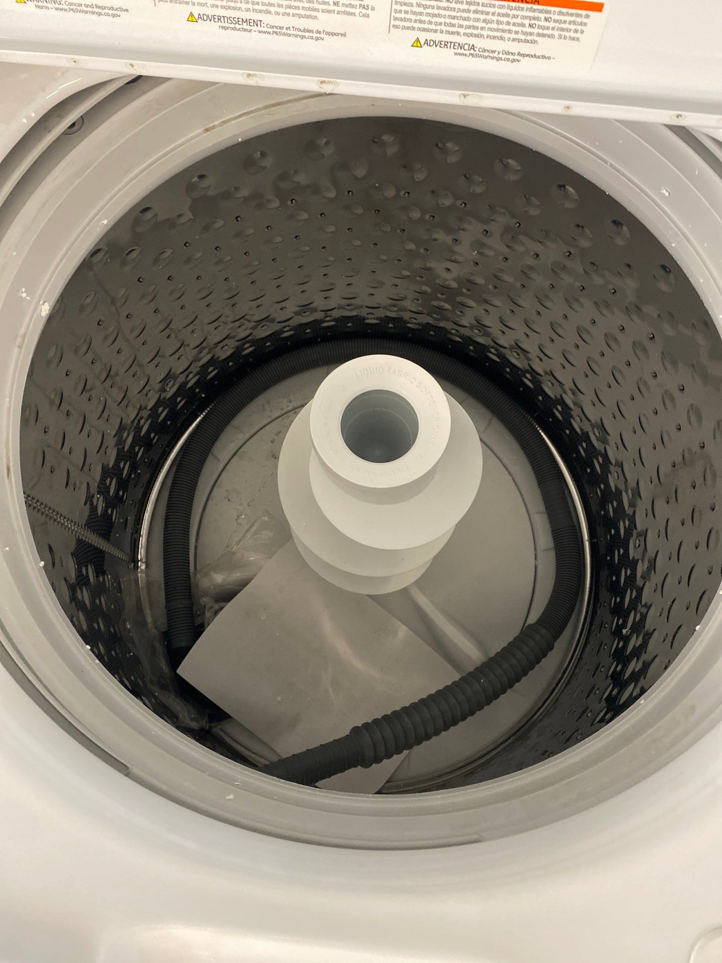 GE Top Load Washer & 7.0 cu. ft. Natural Gas Dryer