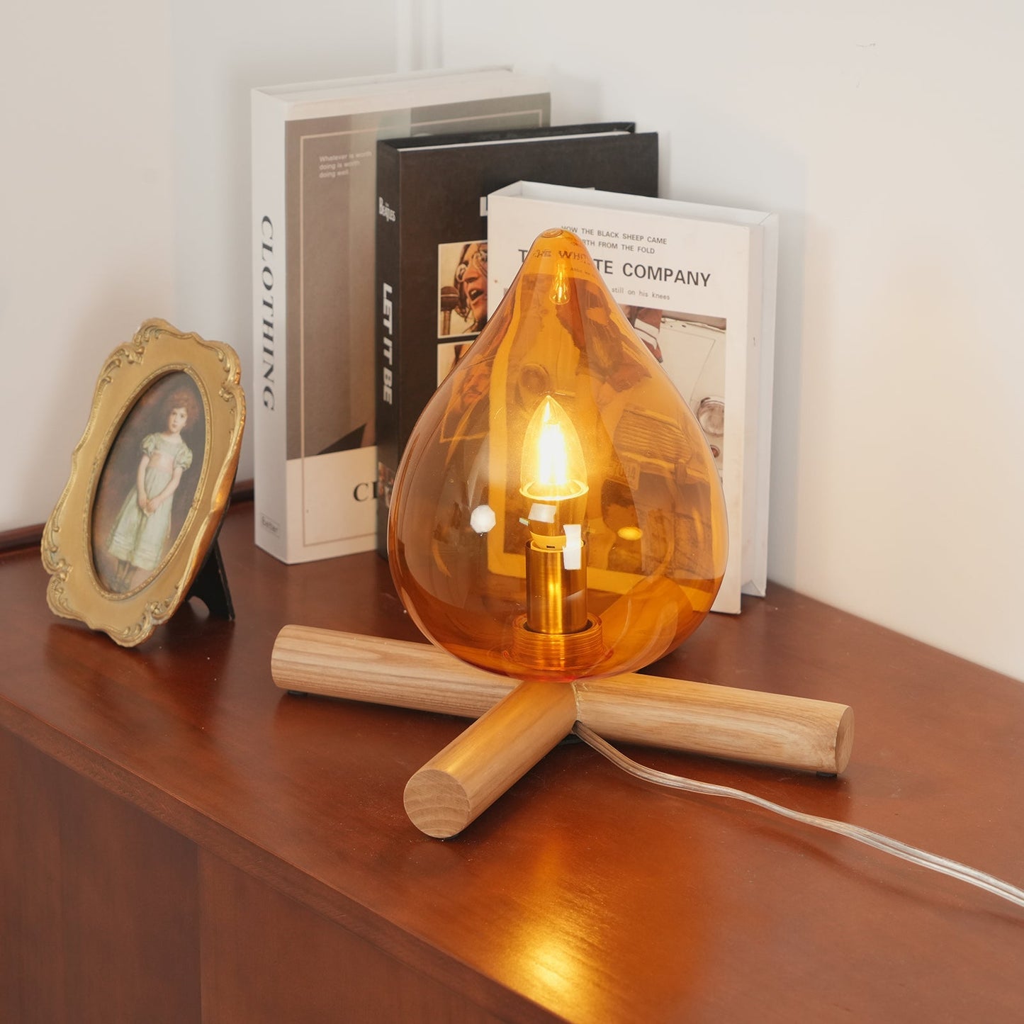 Flame-Inspired Glass Table Lamp With Wooden Cross Base