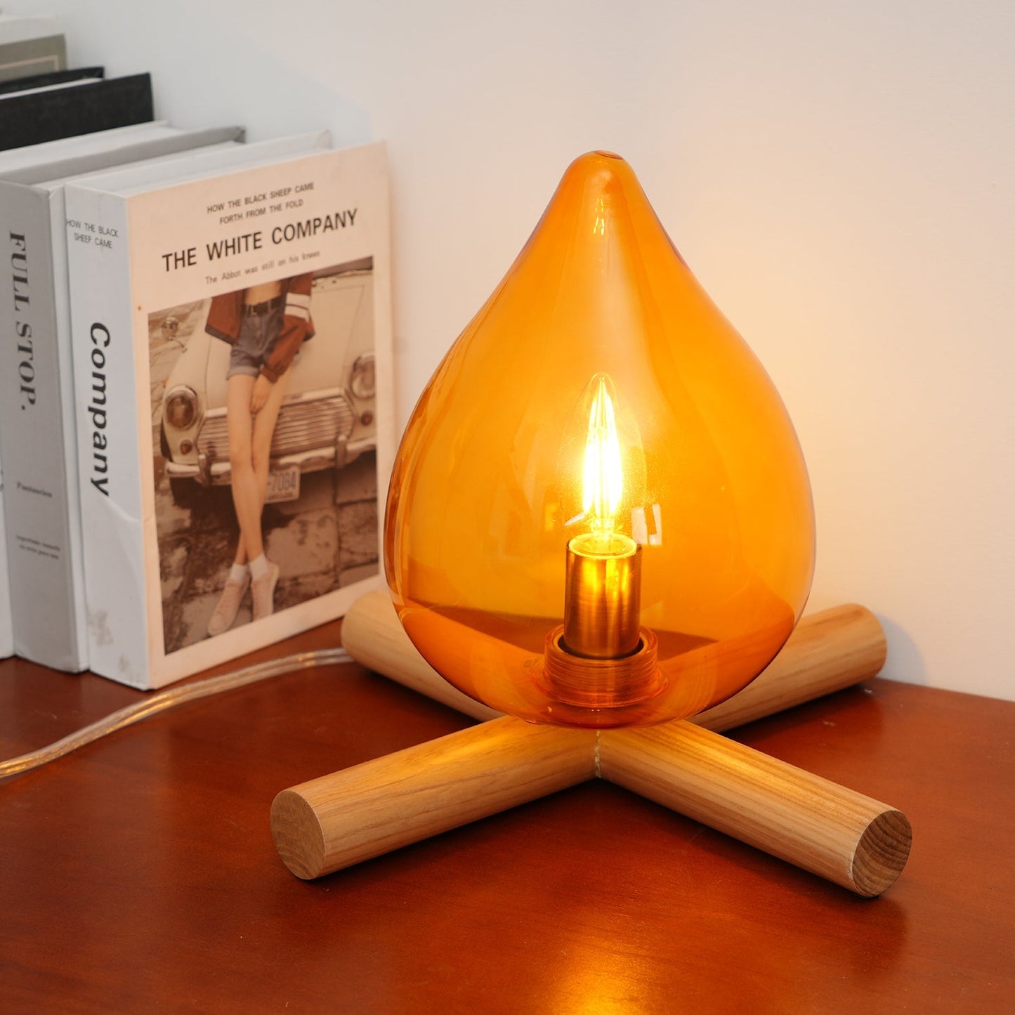 Flame-Inspired Glass Table Lamp With Wooden Cross Base