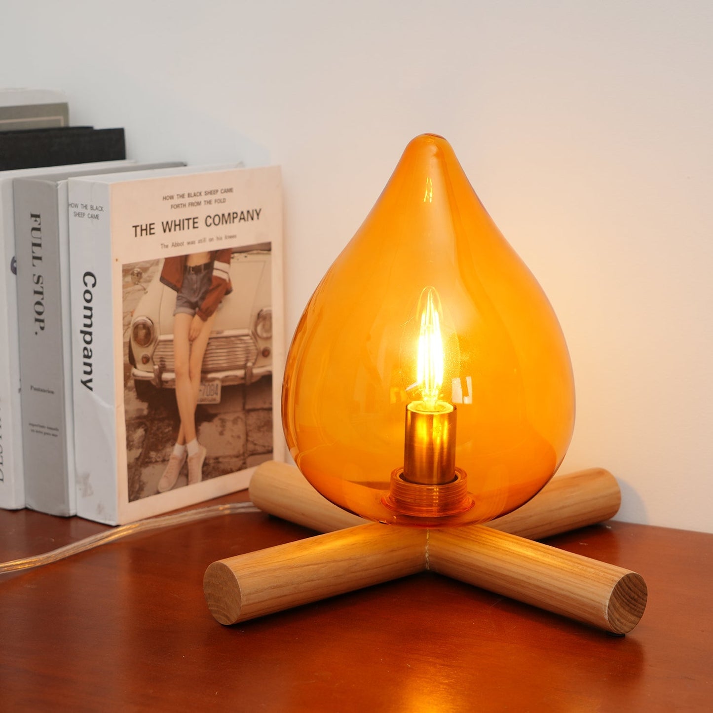 Flame-Inspired Glass Table Lamp With Wooden Cross Base