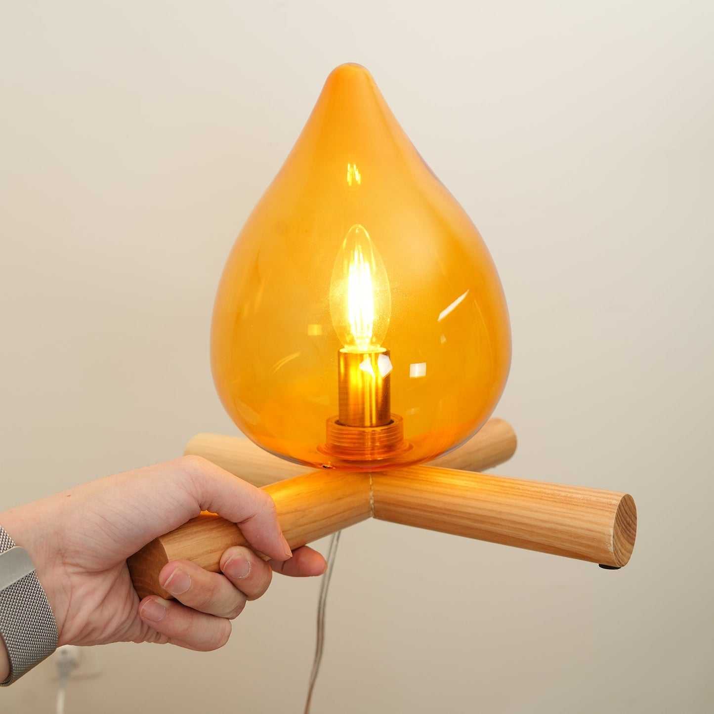 Flame-Inspired Glass Table Lamp With Wooden Cross Base