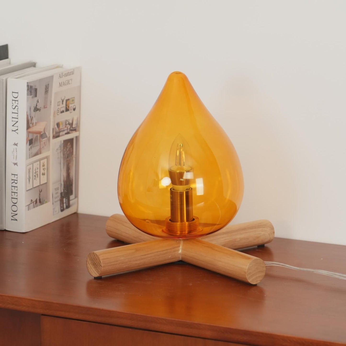 Flame-Inspired Glass Table Lamp With Wooden Cross Base