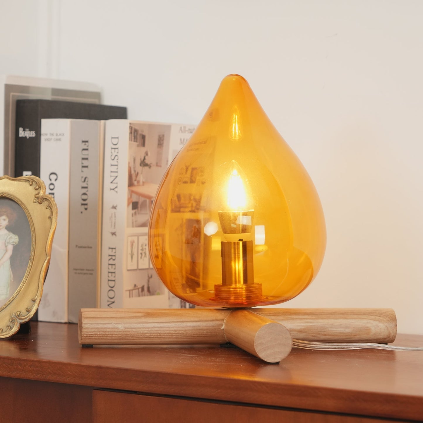 Flame-Inspired Glass Table Lamp With Wooden Cross Base