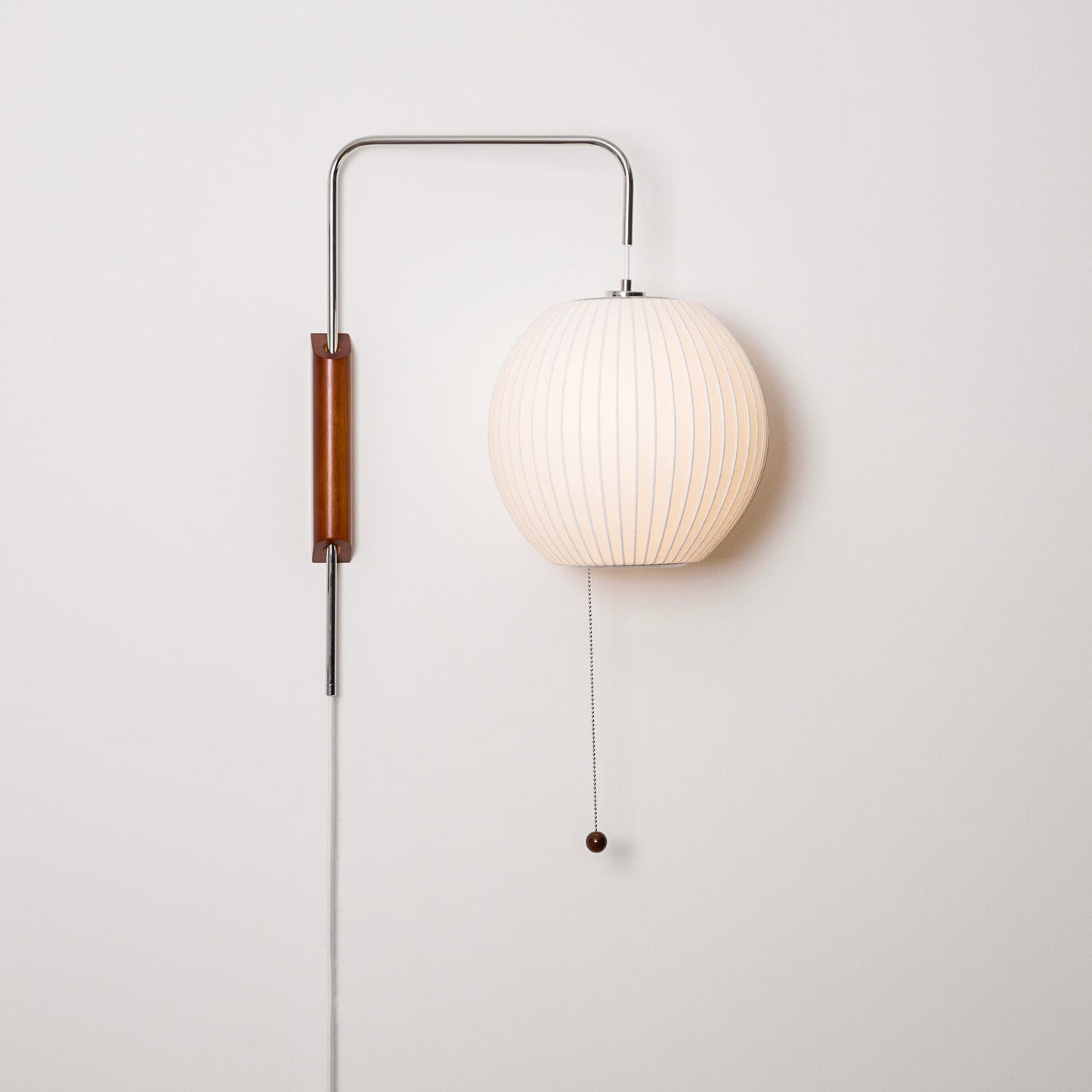 Ribbed Oval Wall Sconce With Pull Chain And Curved Arm