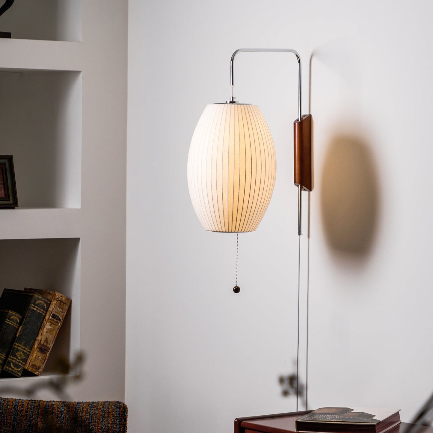 Ribbed Oval Wall Sconce With Pull Chain And Curved Arm