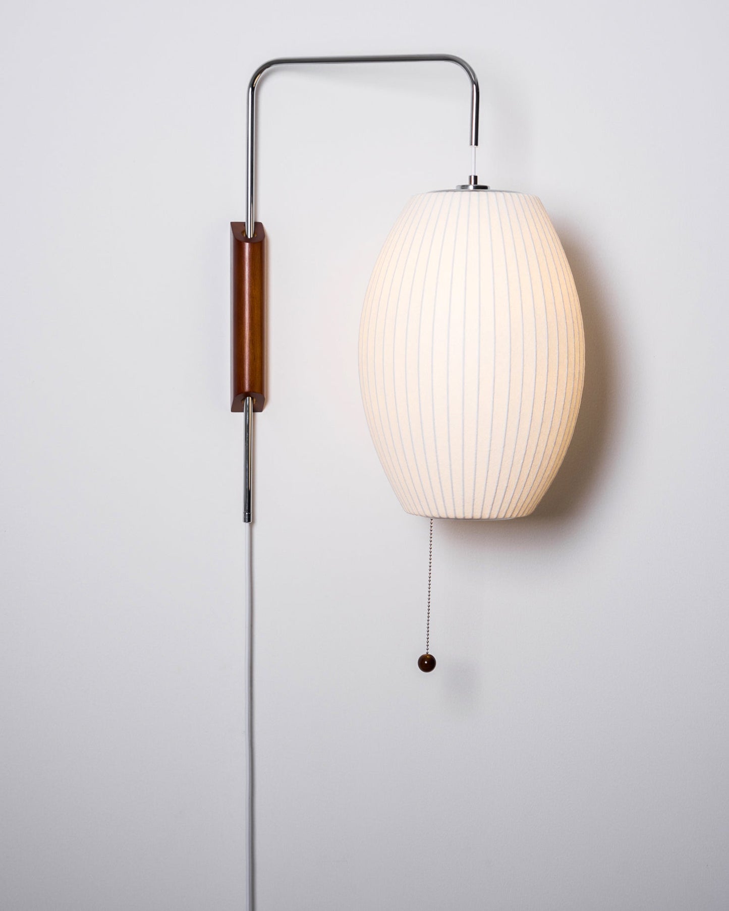 Ribbed Oval Wall Sconce With Pull Chain And Curved Arm