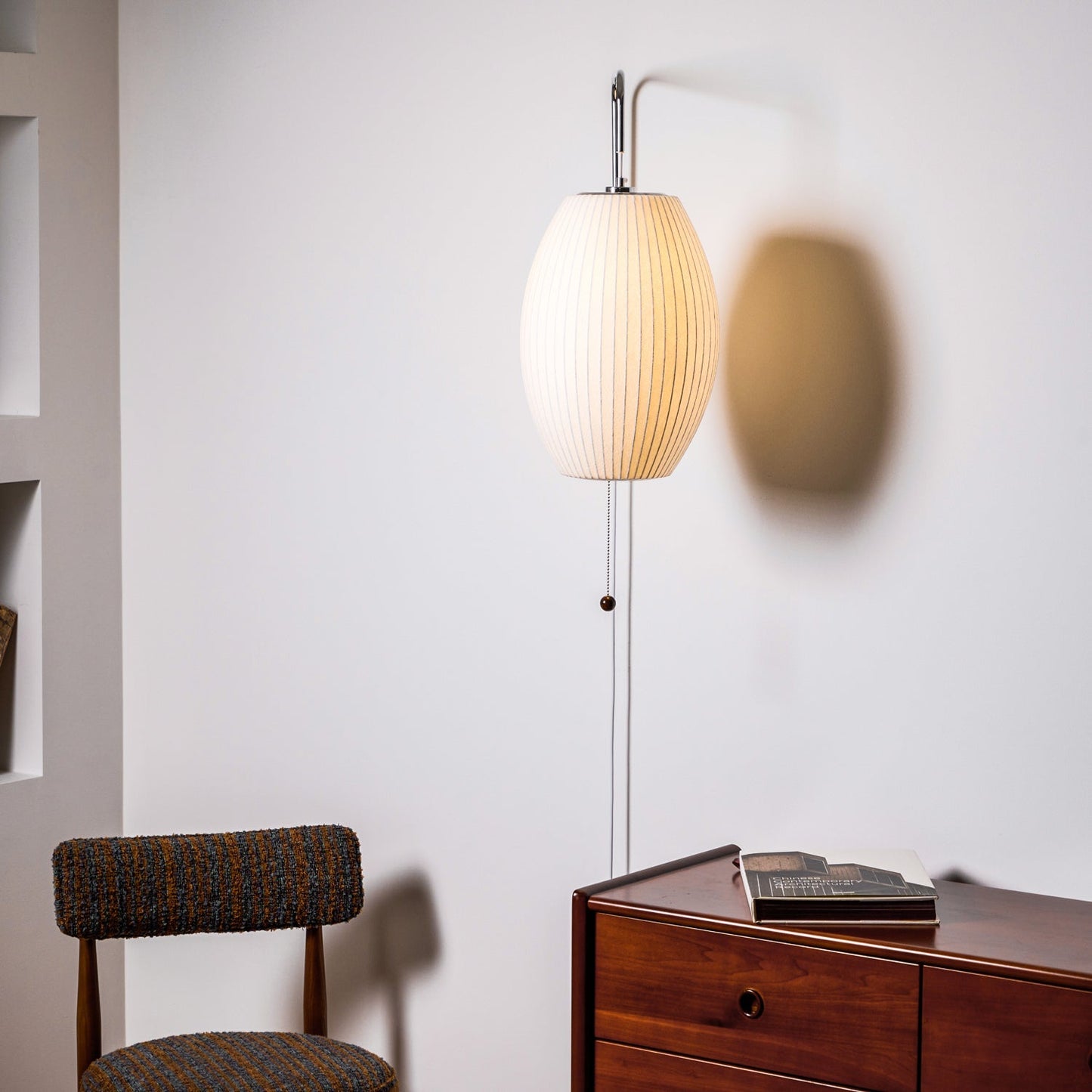 Ribbed Oval Wall Sconce With Pull Chain And Curved Arm