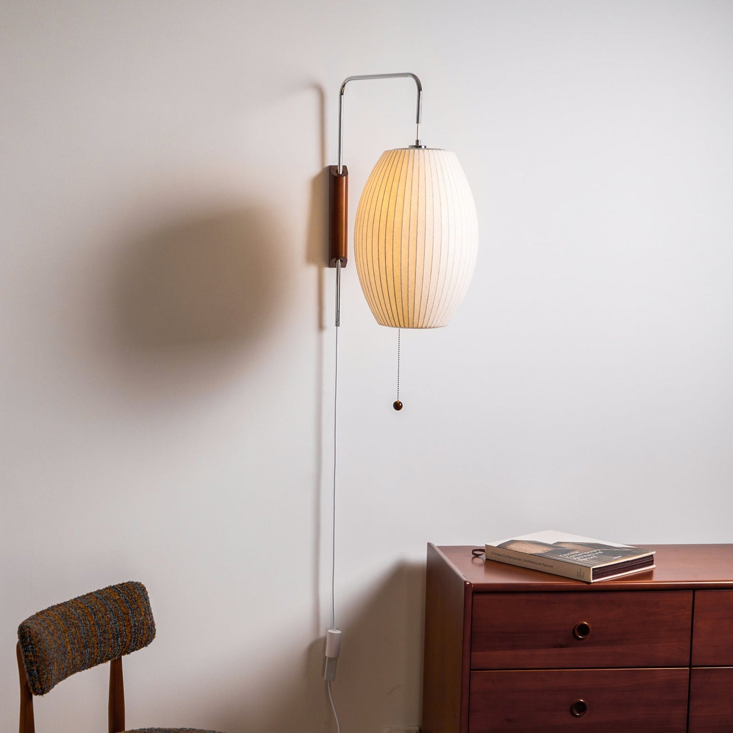 Ribbed Oval Wall Sconce With Pull Chain And Curved Arm