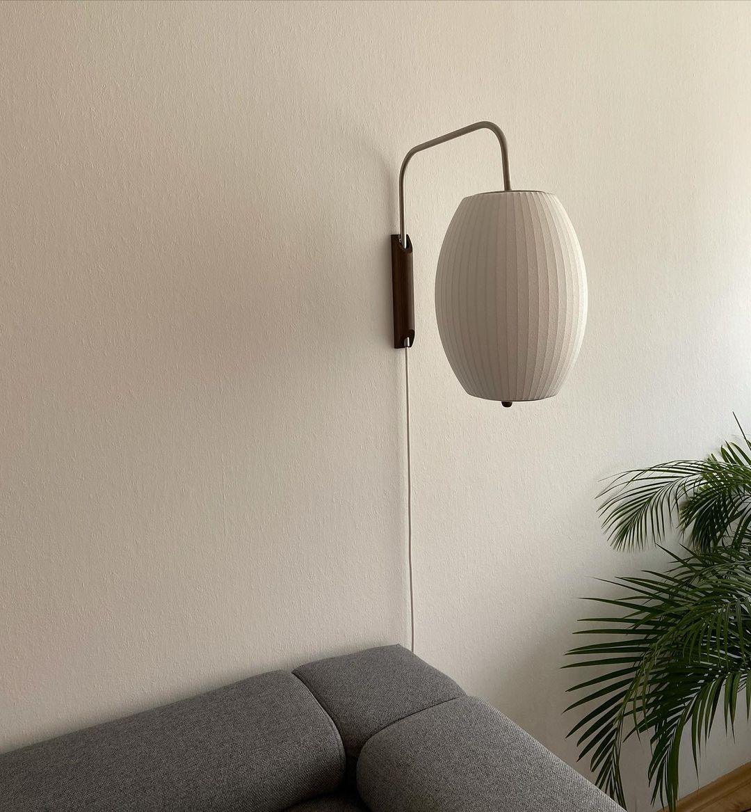Ribbed Oval Wall Sconce With Pull Chain And Curved Arm