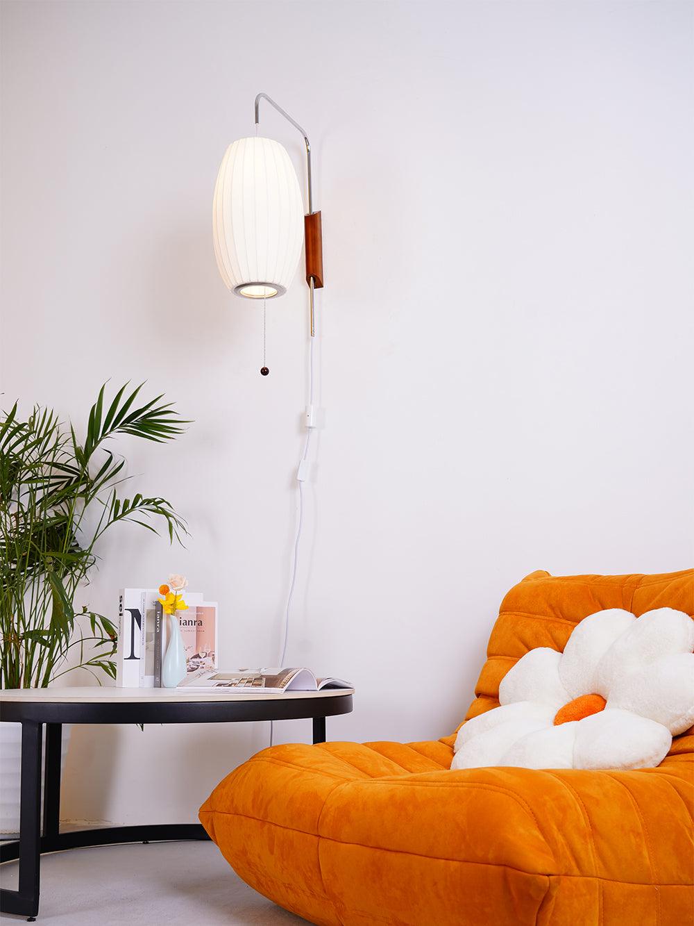 Ribbed Oval Wall Sconce With Pull Chain And Curved Arm