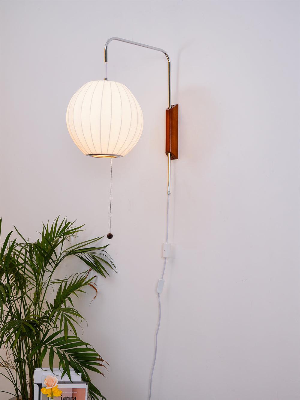 Ribbed Oval Wall Sconce With Pull Chain And Curved Arm