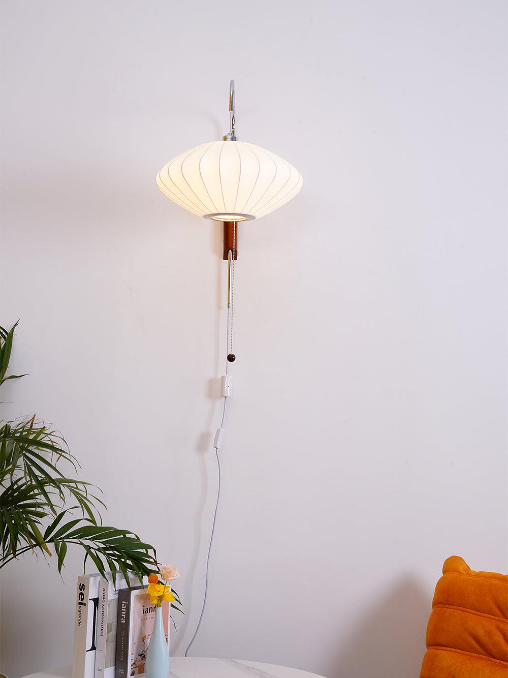 Ribbed Oval Wall Sconce With Pull Chain And Curved Arm