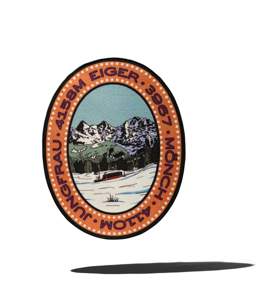 MEDALLION-SHAPED MOUNTAIN RUG: DREI BERGE