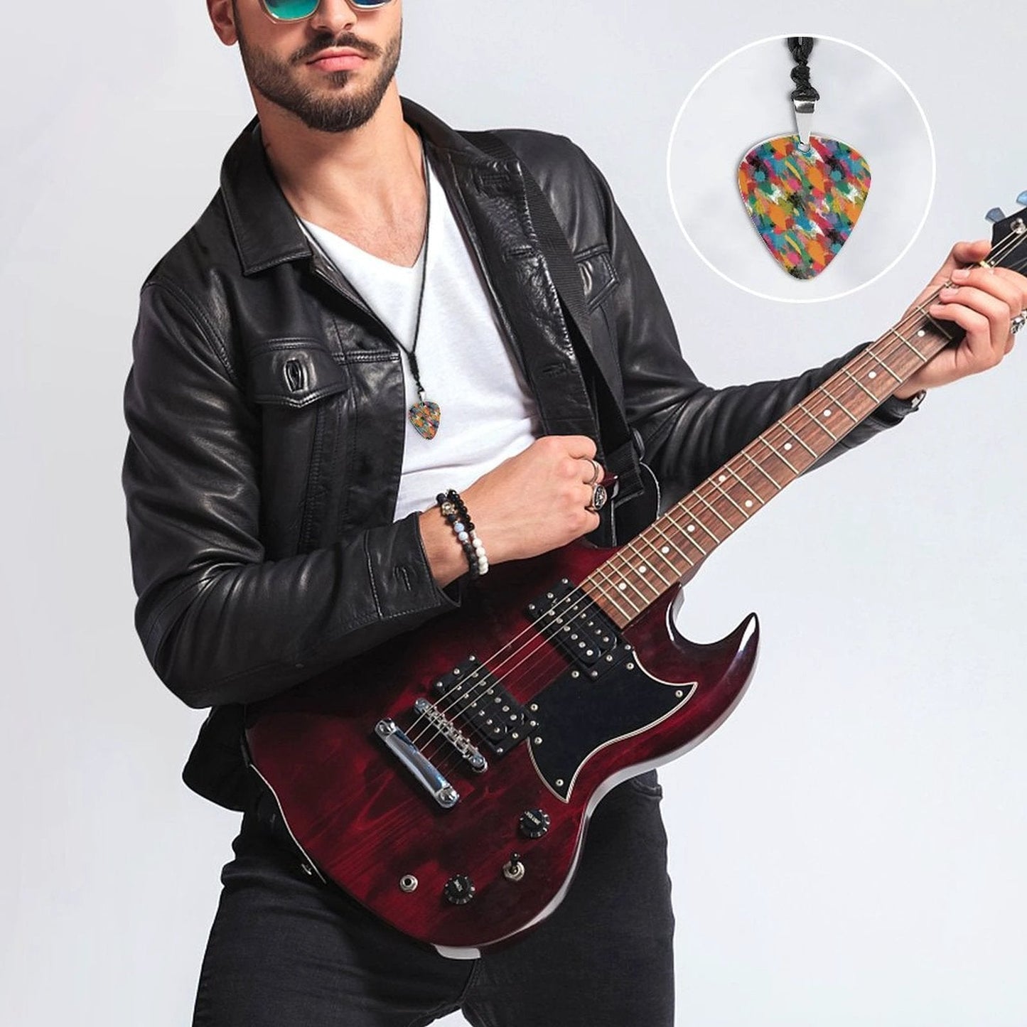 Painted Camo Guitar Pick Necklace — Multicolor Brush-Dab Pendant for Music Heads