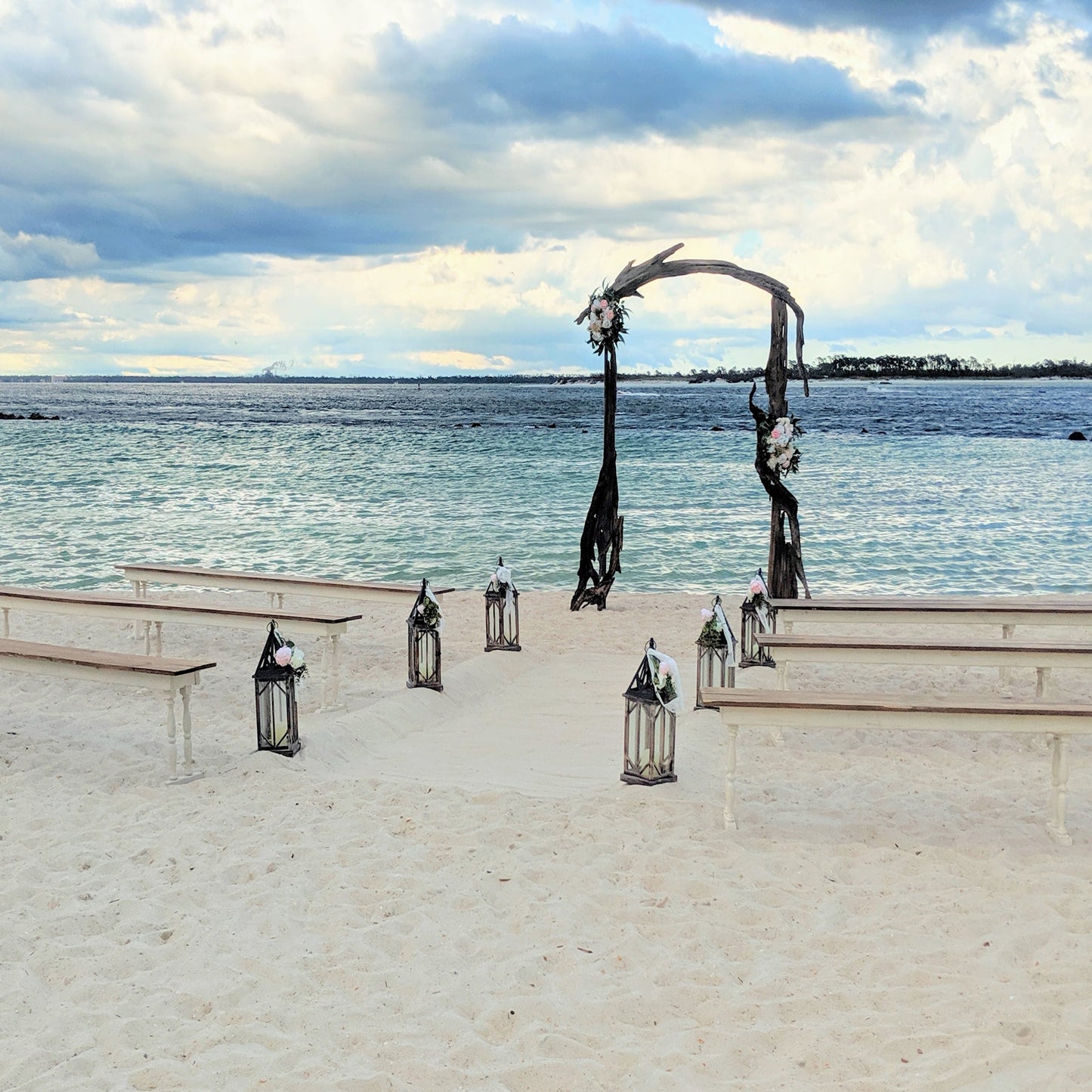 A Stunning Day Wedding Ceremony Package (Officiant, Photographer, Decor with Seating)